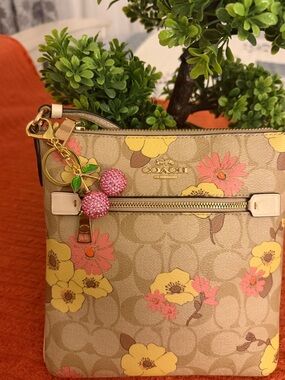 Coach Tan Signature Floral Crossbody with Yellow and Pink Accents